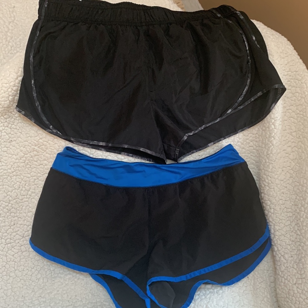 Black with grey trim swirl and black with royal blue size xl SO brand 2 pair